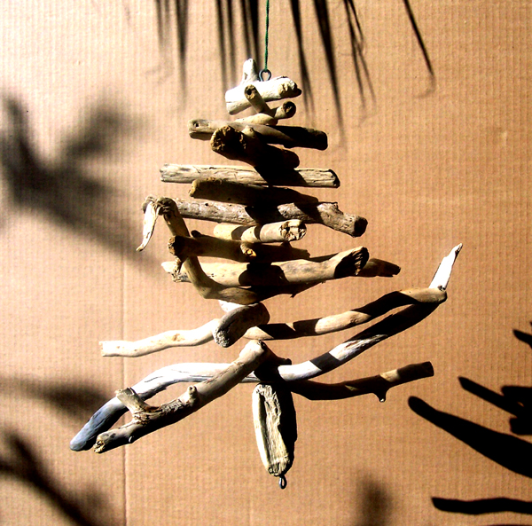 driftwood Christmas tree hanging outdoors